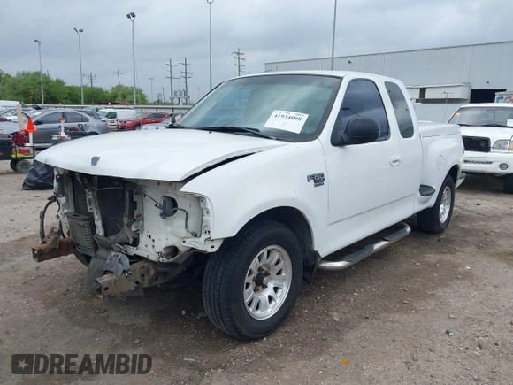 2001 Ford F-150 XL with VIN 2FTRX07L21CA73710, listed as a IAAI auction lot 41934098 with 1 mi miles. Bid and sale history available at carsss.com. Image 2.