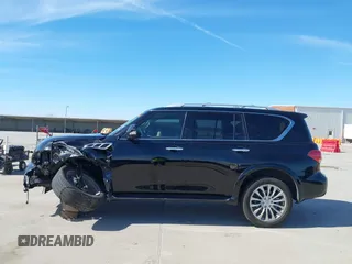2016 Infiniti QX80 with VIN JN8AZ2NF5G9613566, listed as a IAAI auction lot 41820159 with 91,604 mi miles. Bid and sale history available at carsss.com. Image 14.