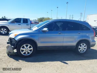 2007 Honda CR-V EX-L with VIN JHLRE38727C025330, listed as a IAAI auction lot 41844216 with 170,183 mi miles. Bid and sale history available at carsss.com. Image 14.