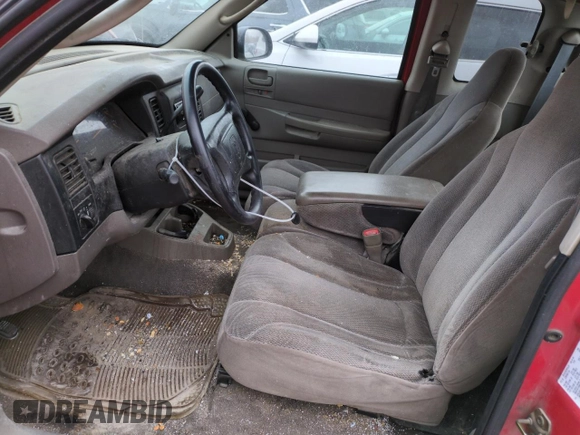 2001 Dodge Dakota z VIN 1B7GL22X41S256594, wystawiony jako Copart lot #43012935 z przebiegiem 217 179 mil mil oraz Szkoda całkowita • Salvage title. Historia ofert i sprzedaży dostępna na DreamBid. Obrazek 7.