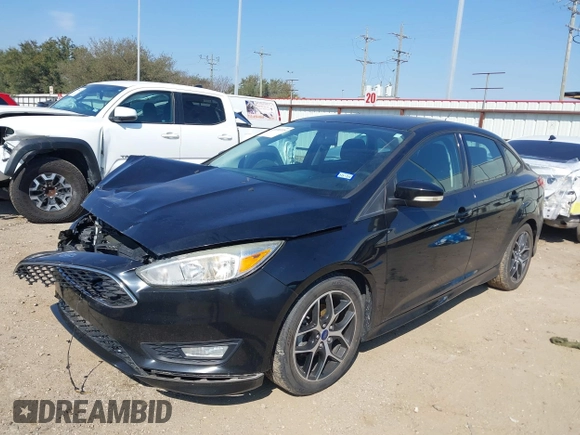 2016 Ford Focus SE with VIN 1FADP3F25GL344302, listed as a IAAI auction lot 41690335 with 43,143 mi miles. Bid and sale history available at carsss.com. Image 2.