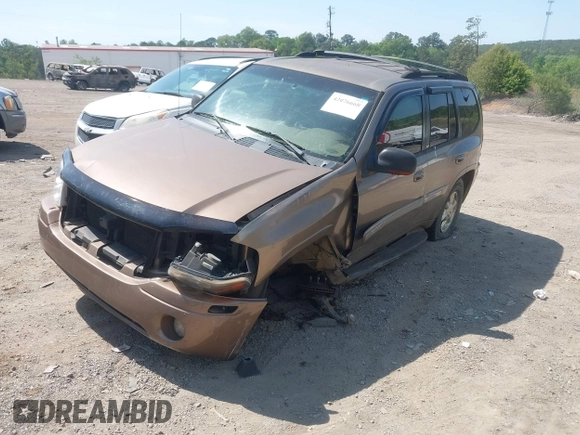 2003 GMC Envoy SLT with VIN 1GKDS13S832208655, listed as a IAAI auction lot 42076668 with 160,787 mi miles. Bid and sale history available at carsss.com. Image 2.