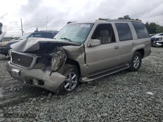 2000 Cadillac Escalade with VIN 1GYEK13R5YR112858, listed as a Copart auction lot 71651294 with 228,689 mi miles and Salvage Title. Bid and sale history available at carsss.com. Image 1.