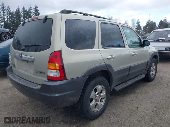 2003 Mazda Tribute ES with VIN 4F2CZ96193KM10389, listed as a IAAI auction lot 41938872 with 179,722 mi miles and . Bid and sale history available at DreamBid. Image 4.