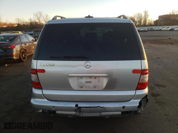 2002 Mercedes-Benz M-Class with VIN 4JGAB54E32A312131, listed as a Copart auction lot 80490084 with 165,365 mi miles and Salvage Title. Bid and sale history available at carsss.com. Image 6.