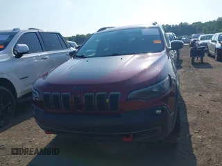 2019 Jeep Cherokee Trailhawk with VIN 1C4PJMBX5KD421043, listed as a IAAI auction lot 42570336 with 114,463 mi miles and . Bid and sale history available at DreamBid. Image 11.
