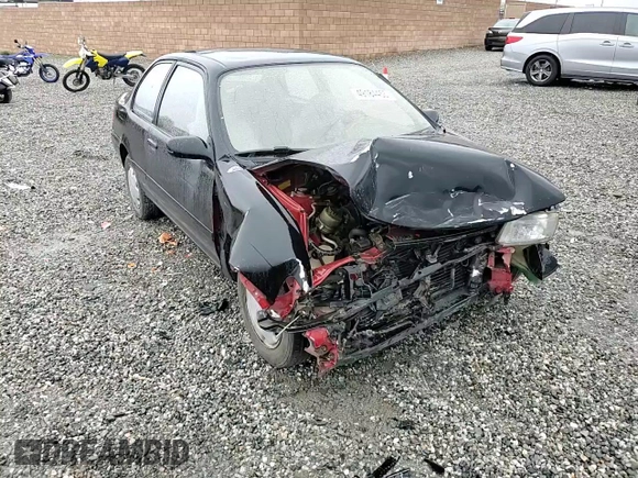 1991 Toyota Tercel z VIN JT2EL43B3M0053811, wystawiony jako Copart lot #49184455 z przebiegiem 105 982 mil mil oraz Szkoda całkowita • Salvage title. Historia ofert i sprzedaży dostępna na DreamBid. Obrazek 11.