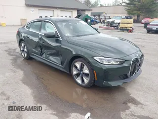 2024 BMW i4 eDrive40 z VIN WBY73AW07RFS54641, wystawiony jako IAAI lot #42187165 z przebiegiem 5 376 mil mil oraz . Historia ofert i sprzedaży dostępna na DreamBid. Obrazek 1.