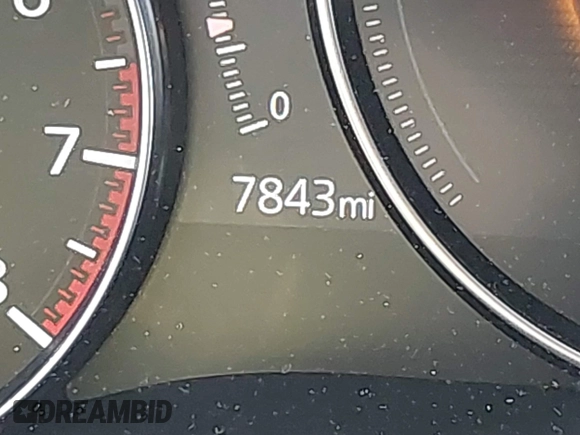 2024 Mazda CX-50 S Premium z VIN 7MMVABDM7RN231991, wystawiony jako IAAI lot #42481427 z przebiegiem 7 843 mil mil oraz . Historia ofert i sprzedaży dostępna na DreamBid. Obrazek 16.