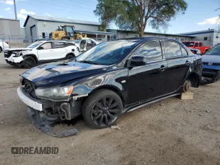 2009 Mitsubishi Lancer with VIN JA3AV66V39U039262, listed as a Copart auction lot 69342714 with 86,000 mi miles and Salvage Title. Bid and sale history available at DreamBid. Image 1.