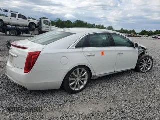 2016 Cadillac XTS Luxury Collection with VIN 2G61M5S34G9209483, listed as a Copart auction lot 54611105 with 23,778 mi miles and Salvage title. Bid and sale history available at DreamBid. Image 3.
