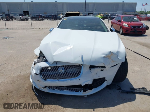 2012 Jaguar XJ XJL with VIN SAJWA2GB3CLV38500, listed as a IAAI auction lot 41990409 with 73,793 mi miles and . Bid and sale history available at DreamBid. Image 12.