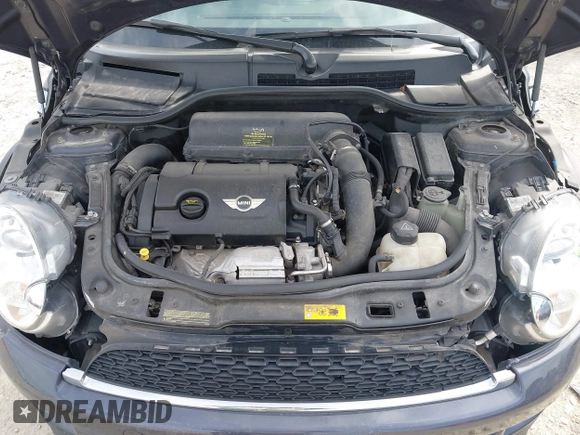 2013 MINI Coupe S with VIN WMWSX3C50DT466882, listed as a IAAI auction lot 42026938 with 99,499 mi miles and . Bid and sale history available at DreamBid. Image 10.