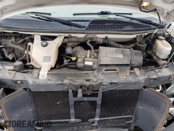 2012 Chevrolet Express Passenger 1LT with VIN 1GAZGYFG8C1174282, listed as a Copart auction lot 86012024 with 170,680 mi miles and Salvage title. Bid and sale history available at DreamBid. Image 12.