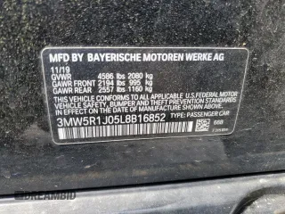 2020 BMW 3 Series 330i with VIN 3MW5R1J05L8B16852, listed as a Copart auction lot 56912105 with 75,379 mi miles and Salvage title. Bid and sale history available at DreamBid. Image 12.