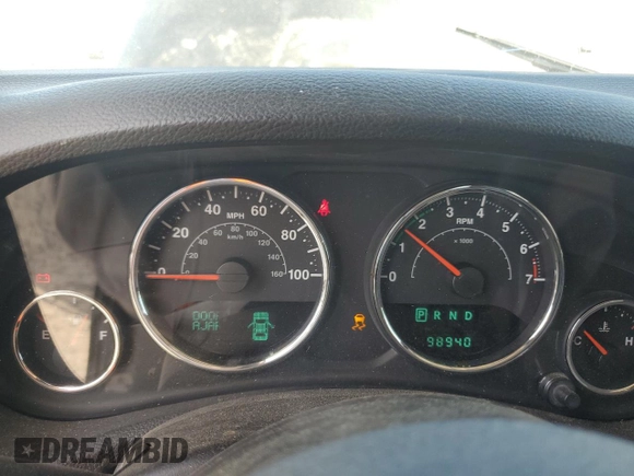 2012 Jeep Wrangler Unlimited Sahara with VIN 1C4HJWEG5CL205826, listed as a Copart auction lot 58222115 with 98,940 mi miles and Salvage title. Bid and sale history available at DreamBid. Image 9.