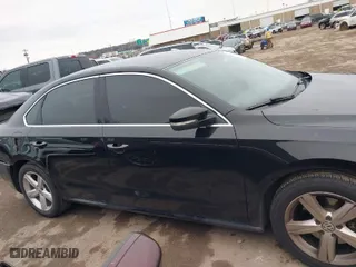 2013 Volkswagen Passat SE w/Sunroof with VIN 1VWBP7A3XDC108598, listed as a IAAI auction lot 41560321 with 94,568 mi miles. Bid and sale history available at carsss.com. Image 13.