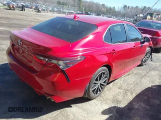 2021 Toyota Camry SE Nightshade with VIN 4T1G11AK1MU405019, listed as a IAAI auction lot 41822878 with 52,174 mi miles and . Bid and sale history available at DreamBid. Image 4.