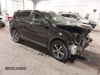 2018 Toyota RAV4 XLE with VIN 2T3RFREV3JW817989, listed as a IAAI auction lot 41636957 with 182,265 mi miles. Bid and sale history available at carsss.com. Image 1.