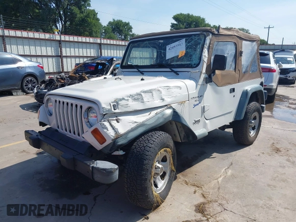 1998 Jeep Wrangler Sport z VIN 1J4FY19S3WP776209, wystawiony jako IAAI lot #42493513 z przebiegiem 113 130 mil mil oraz . Historia ofert i sprzedaży dostępna na DreamBid. Obrazek 2.