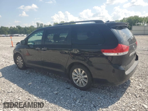 2014 Toyota Sienna Limited with VIN 5TDDK3DC3ES082361, listed as a Copart auction lot 64257095 with 181,233 mi miles and Salvage title. Bid and sale history available at DreamBid. Image 2.