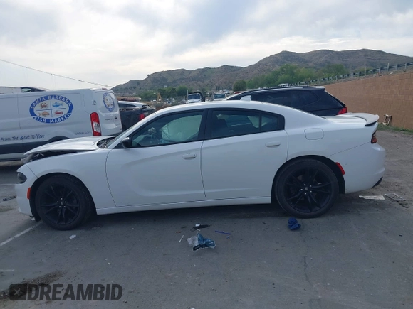 2018 Dodge Charger SXT Plus with VIN 2C3CDXHG4JH187580, listed as a IAAI auction lot 42024602 with 203,843 mi miles and . Bid and sale history available at carsss.com. Image 14.
