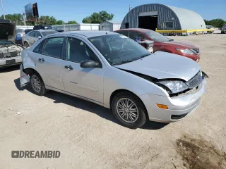 2006 Ford Focus S with VIN 1FAFP34N16W115439, listed as a Copart auction lot 57152855 with Not provided miles and Salvage title. Bid and sale history available at DreamBid. Image 4.