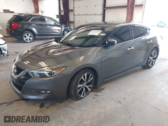 2017 Nissan Maxima SV with VIN 1N4AA6AP1HC427784, listed as a IAAI auction lot 41533604 with 111,295 mi miles and . Bid and sale history available at DreamBid. Image 2.