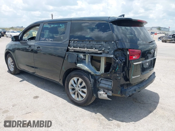 2020 Kia Sedona EX with VIN KNDMB5C19L6617993, listed as a IAAI auction lot 39711859 with 66,083 mi miles. Bid and sale history available at carsss.com. Image 3.