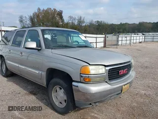 2004 GMC Yukon XL SLT with VIN 3GKEC16Z64G292509, listed as a IAAI auction lot 40948787 with 143,099 mi miles. Bid and sale history available at carsss.com. Image 1.