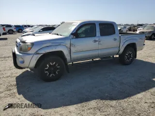 2009 Toyota Tacoma PreRunner with VIN 3TMJU62N59M076621, listed as a Copart auction lot 60740445 with 170,202 mi miles and Salvage title. Bid and sale history available at DreamBid. Image 1.