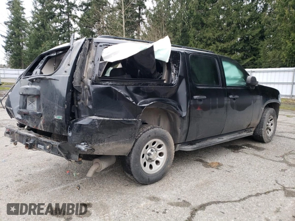 2010 Chevrolet Suburban LS z VIN 1GNUKHE3XAR192464, wystawiony jako Copart lot #87311324 z przebiegiem Nie podano mil oraz Szkoda całkowita • Salvage title. Historia ofert i sprzedaży dostępna na DreamBid. Obrazek 3.