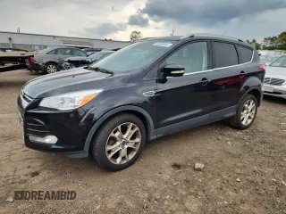 2016 Ford Escape Titanium z VIN 1FMCU9J9XGUB44298, wystawiony jako Copart lot #65049595 z przebiegiem 124 218 mil mil oraz Szkoda całkowita • Salvage title. Historia ofert i sprzedaży dostępna na DreamBid. Obrazek 1.