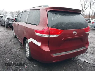 2014 Toyota Sienna XLE with VIN 5TDYK3DC0ES510579, listed as a IAAI auction lot 41470424 with 304,620 mi miles and . Bid and sale history available at DreamBid. Image 3.