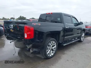 2017 Chevrolet Silverado 1500 LTZ with VIN 3GCUKSEC7HG135770, listed as a IAAI auction lot 41257645 with 155,364 mi miles and . Bid and sale history available at DreamBid. Image 4.