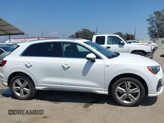 2019 Audi Q3 S line Premium z VIN WA1DECF39K1079763, wystawiony jako IAAI lot #42160517 z przebiegiem 66 924 mil mil oraz . Historia ofert i sprzedaży dostępna na DreamBid. Obrazek 13.