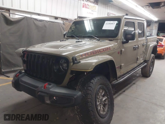 2020 Jeep Gladiator Rubicon z VIN 1C6JJTBGXLL178893, wystawiony jako IAAI lot #42206863 z przebiegiem 29 138 mil mil oraz . Historia ofert i sprzedaży dostępna na DreamBid. Obrazek 18.