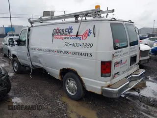 2011 Ford Econoline Cargo Commercial with VIN 1FTNE1EW1BDA17492, listed as a IAAI auction lot 41036647 with 242,810 mi miles and . Bid and sale history available at DreamBid. Image 3.