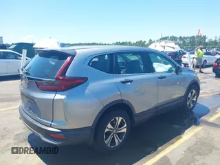 2020 Honda CR-V LX with VIN 7FARW1H26LE002413, listed as a IAAI auction lot 42318905 with 63,698 mi miles and . Bid and sale history available at DreamBid. Image 4.