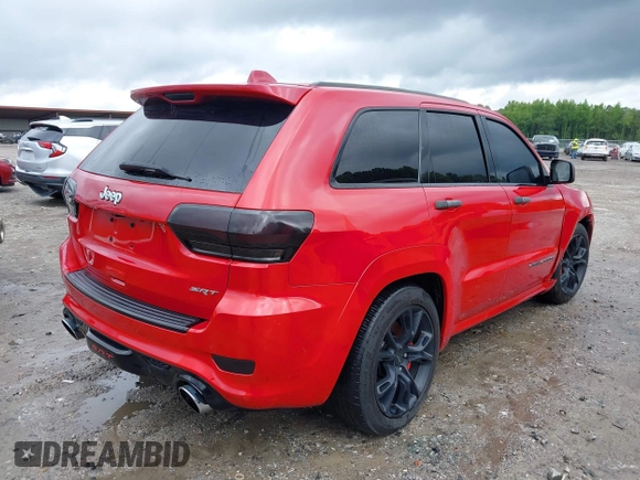 2017 Jeep Grand Cherokee SRT z VIN 1C4RJFDJXHC670370, wystawiony jako IAAI lot #41524965 z przebiegiem 87 276 mil mil oraz . Historia ofert i sprzedaży dostępna na DreamBid. Obrazek 4.