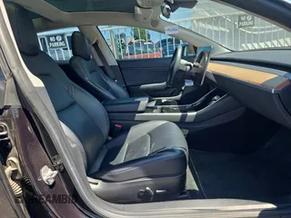 2018 Tesla Model 3 Long Range Battery z VIN 5YJ3E1EB8JF070461, wystawiony jako Copart lot #58379905 z przebiegiem 49 178 mil mil oraz Tytuł czysty. Historia ofert i sprzedaży dostępna na DreamBid. Obrazek 5.