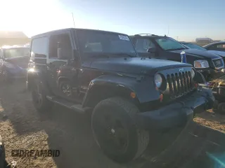2011 Jeep Wrangler Sahara with VIN 1J4GA5D16BL567739, listed as a Copart auction lot 73542244 with 282,392 mi miles and Non Repairable. Bid and sale history available at DreamBid. Image 4.
