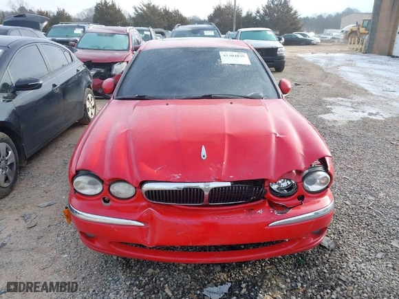 2002 Jaguar X-Type with VIN SAJEA51C22WC54063, listed as a IAAI auction lot 41404835 with NaN miles. Bid and sale history available at carsss.com. Image 12.