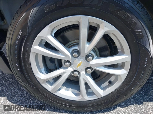 2017 Chevrolet Equinox LS with VIN 2GNFLEEK9H6305144, listed as a IAAI auction lot 42180603 with 128,433 mi miles and . Bid and sale history available at DreamBid. Image 12.