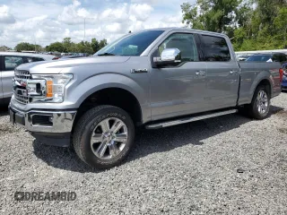2020 Ford F-150 XL with VIN 1FTFW1E4XLFB99974, listed as a Copart auction lot 61609215 with 59,011 mi miles and Salvage title. Bid and sale history available at DreamBid. Image 1.