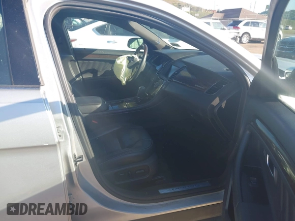 2014 Ford Taurus Limited with VIN 1FAHP2F8XEG133523, listed as a IAAI auction lot 40285220 with 134,939 mi miles. Bid and sale history available at carsss.com. Image 5.