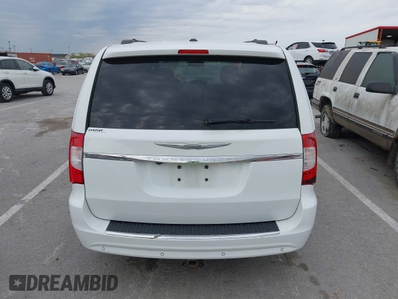 2015 Chrysler Town & Country Touring-L with VIN 2C4RC1CG9FR573863, listed as a IAAI auction lot 42036034 with 141,390 mi miles. Bid and sale history available at carsss.com. Image 16.