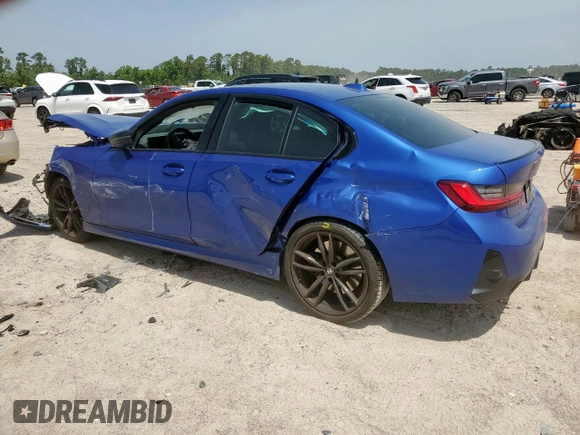 2023 BMW 3 Series 330i with VIN 3MW69FF00P8D04288, listed as a Copart auction lot 57181315 with 35,461 mi miles and Salvage title. Bid and sale history available at DreamBid. Image 2.