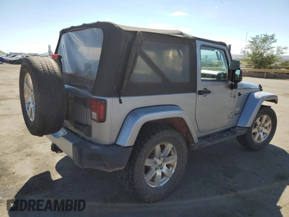 2015 Jeep Wrangler Sahara с VIN 1C4AJWBG1FL742588, выставлен на аукционе Copart как лот 72400274 с пробегом 139 520 миль миль и Списание • Salvage title. История ставок и продаж доступна на DreamBid. Изображение 3.