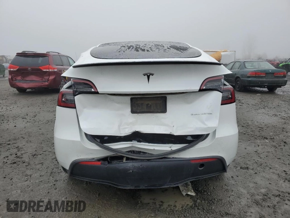 2021 Tesla Model Y Long Range with VIN 5YJYGDEE1MF267004, listed as a Copart auction lot 88708485 with 65,669 mi miles and Salvage Title. Bid and sale history available at DreamBid. Image 6.